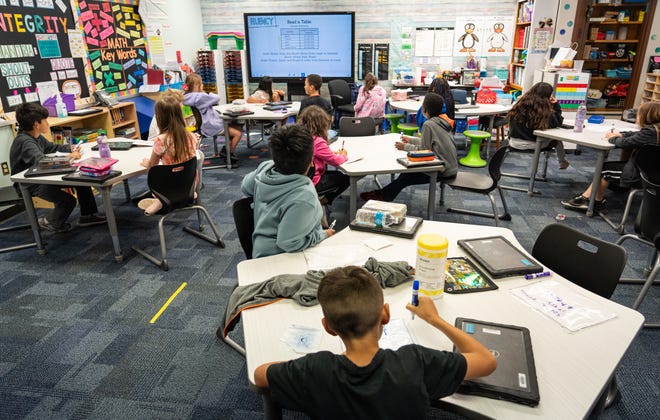 A fourth grade class learns how to read tables Wednesday at Jack Frost Elementary School in Georgetown. Georgetown will vote on a $649.5 million school bond proposal in the upcoming election. Proposition A includes renovating a nearby middle school to become the new location of the old, overcrowded elementary school.
