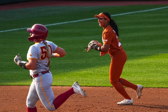 Texas Longhorns short stop Viviana Martinez (23) celebrates a third out as she leaves the field during the game against Iowa State at Red and Charline McCombs Field on Friday, April 26, 2024 in Austin.