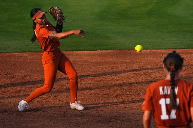 Texas Longhorns infielder Alyssa Washington (11) throws the ball to first during the game against Iowa State at Red and Charline McCombs Field on Friday, April 26, 2024 in Austin.