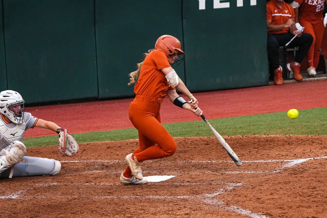 Texas Longhorns outfielder Ashton Maloney (7) hits the ball during the game against Iowa State at Red and Charline McCombs Field on Friday, April 26, 2024 in Austin.